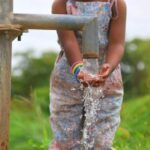girl-washing-her-hands-at-a-water-well-in-burkina-faso-africa-e1659542851666-pt5sd3fofldk6k3juaqpn33bg5dkdpt4b41abg1ezc